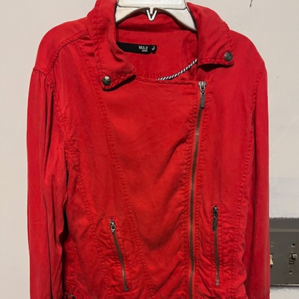 Size small asymmetrical zippered jacket with zipper cuffs, red/salmon color